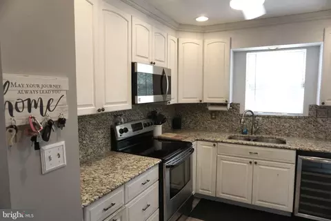 Kitchen - 8610 Oak Rd, Sparrows Point, MD 21219 photo 3 of 7