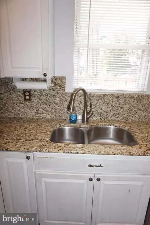 Kitchen - 8610 Oak Rd, Sparrows Point, MD 21219 photo 5 of 7