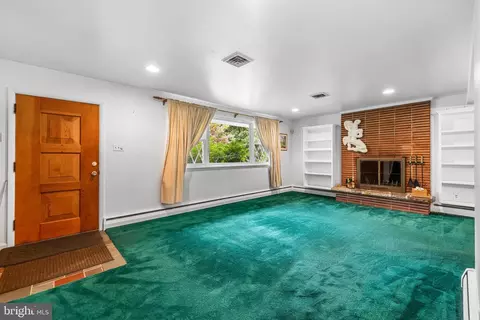 Living - 1304 Heather Hill Rd, Baltimore, MD 21239 photo 1 of 8