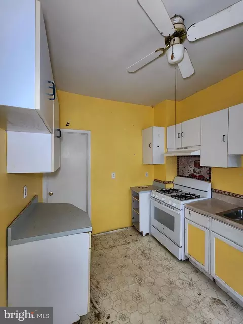 Kitchen - 1909 Hammonds Ferry Rd, Halethorpe, MD 21227 photo 2 of 3