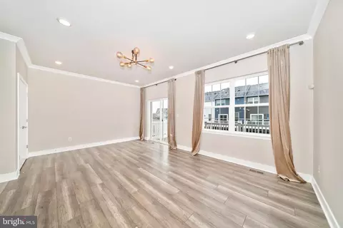 Living - 7876 Johnnycake Rd, Windsor Mill, MD 21244 photo 1 of 2