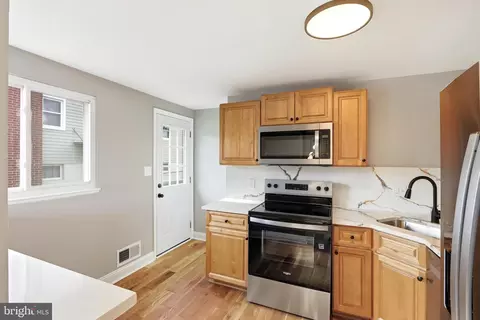Kitchen - 5006 Shelbourne Rd, Halethorpe, MD 21227 photo 2 of 2