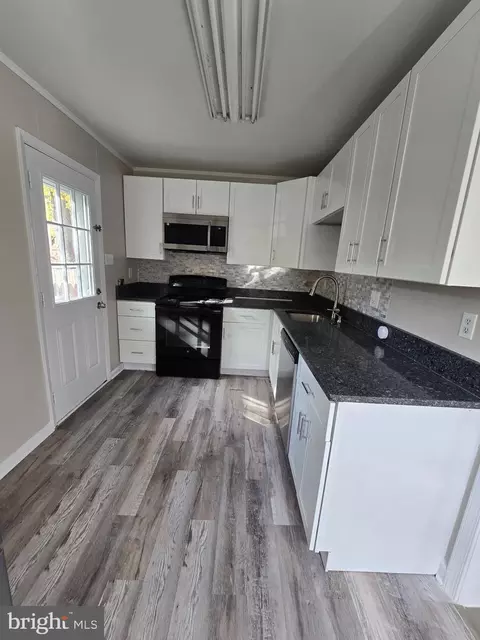 Kitchen - 8200 Mitnick Rd, Nottingham, MD 21236 photo 2 of 2