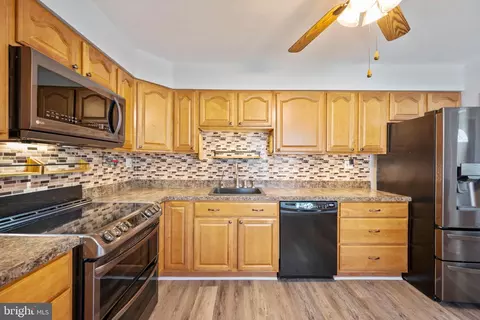 Kitchen - 8626 Wise Ave, Dundalk, MD 21222 photo 3 of 4