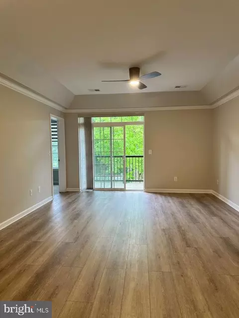 Living - 7201 Travertine Dr #201, Baltimore, MD 21209 photo 2 of 3