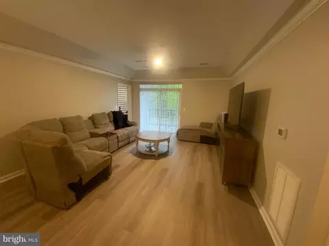 Living - 7201 Travertine Dr #201, Baltimore, MD 21209 photo 1 of 3