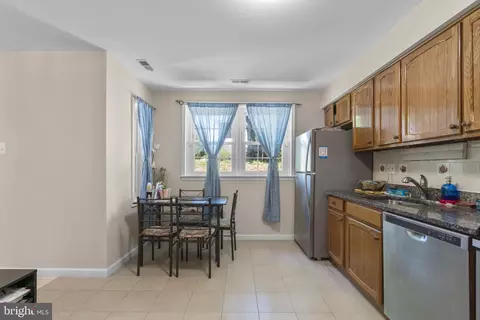 Kitchen - 63 Tallow Ct #3-6F, Windsor Mill, MD 21244 photo 2 of 2