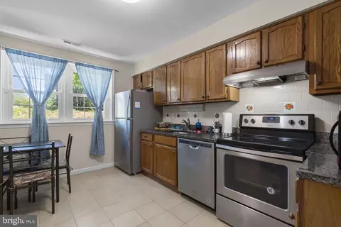 Kitchen - 63 Tallow Ct #3-6F, Windsor Mill, MD 21244 photo 1 of 2