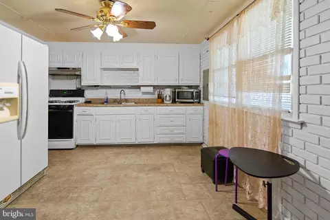 Kitchen - 3311 Kessler Ct, Halethorpe, MD 21227 photo 1 of 1