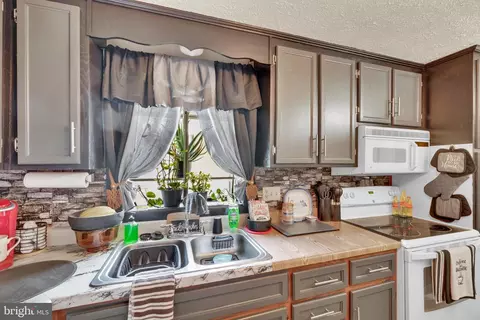 Kitchen - 8029 A Shore Rd, Edgemere, MD 21219 photo 2 of 2