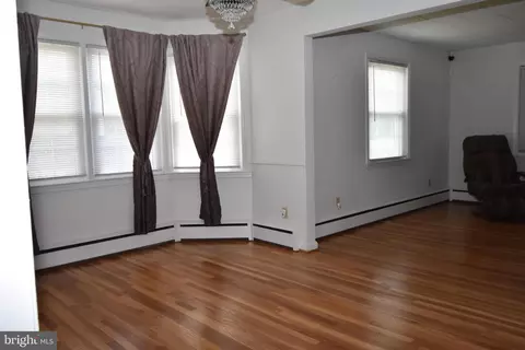 Living - 3403 N Rolling Rd, Windsor Mill, MD 21244 photo 2 of 5
