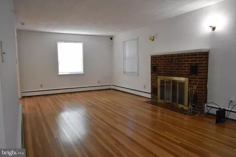 Living - 3403 N Rolling Rd, Windsor Mill, MD 21244 photo 1 of 4