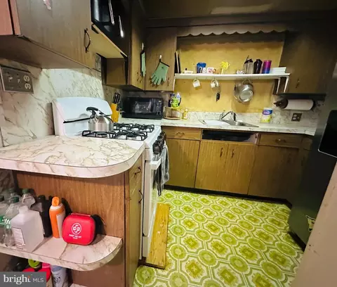 Kitchen - 8608 Oak Rd, Sparrows Point, MD 21219 photo 2 of 2