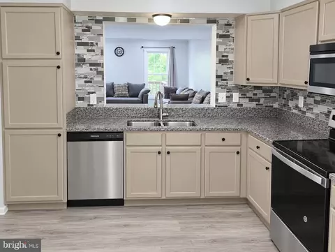 Kitchen - 1635 Winding Brook Way, Windsor Mill, MD 21244 photo 2 of 2