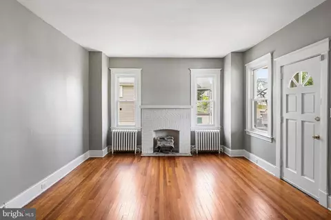 Living - 910 Saint Charles Ave, Baltimore, MD 21229 photo 1 of 3