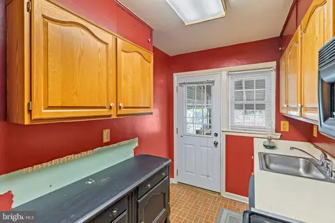 Kitchen - 5556 Dolores Ave, Halethorpe, MD 21227 photo 1 of 2