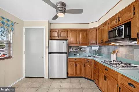 Kitchen - 5126 Mcfaul Rd, Baltimore, MD 21206 photo 1 of 4