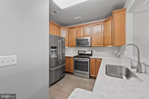 Kitchen - 7701 Travertine Dr #401, Baltimore, MD 21209 photo 3 of 8