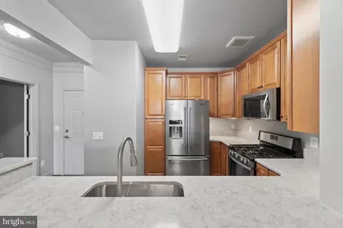 Kitchen - 7701 Travertine Dr #401, Baltimore, MD 21209 photo 8 of 8