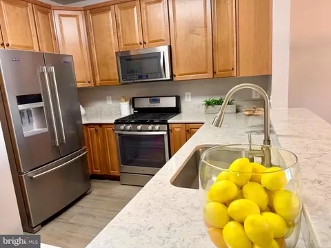 Kitchen - 7701 Travertine Dr #401, Baltimore, MD 21209 photo 1 of 8