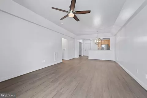 Living - 7701 Travertine Dr #401, Baltimore, MD 21209 photo 6 of 7