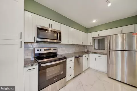 Kitchen - 6943 Clearwind Ct #6943C, Baltimore, MD 21209 photo 2 of 3