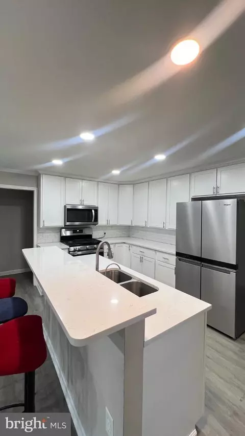 Kitchen - 4427 Annapolis Rd, Halethorpe, MD 21227 photo 2 of 3