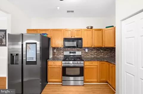 Kitchen - 5174 Brightleaf Ct #5174, Rosedale, MD 21237 photo 2 of 3