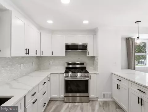 Kitchen - 5659 Braxfield Rd, Halethorpe, MD 21227 photo 1 of 2
