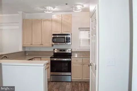 Kitchen - 105 Square Rigger Way #105, Solomons, MD 20688 photo 2 of 3