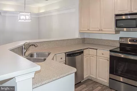 Kitchen - 105 Square Rigger Way #105, Solomons, MD 20688 photo 1 of 3
