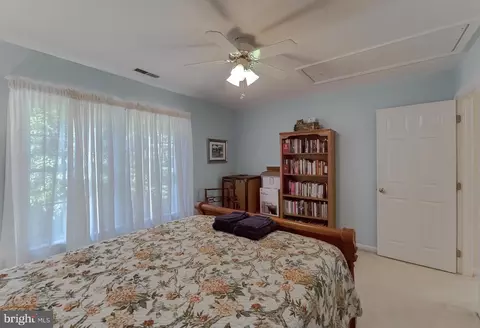 Bedroom - 13405 Lore Pines Ln, Solomons, MD 20688 photo 7 of 9