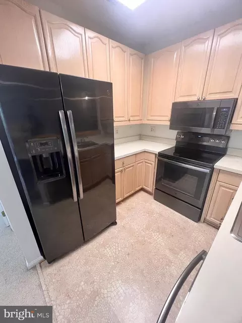 Kitchen - 103 Square Rigger Way #103, Solomons, MD 20688 photo 2 of 2