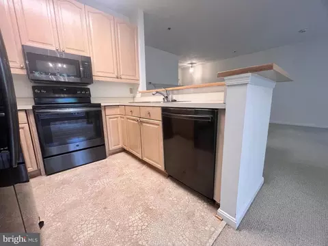 Kitchen - 103 Square Rigger Way #103, Solomons, MD 20688 photo 1 of 2