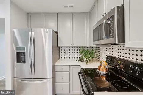 Kitchen - 770 Belle Field Rd #107, Solomons, MD 20688 photo 2 of 3