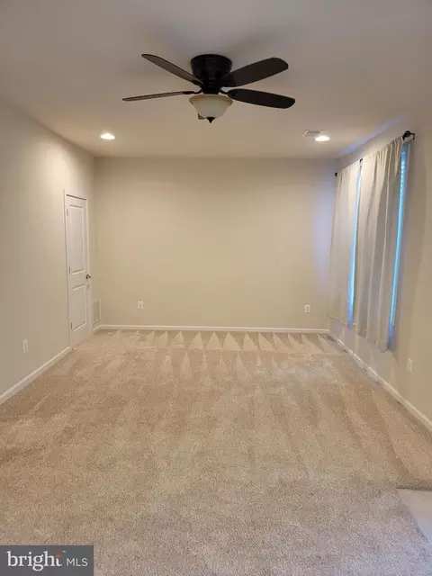 Living - 210 Oyster Bay Pl #C2, Solomons, MD 20688 photo 5 of 7