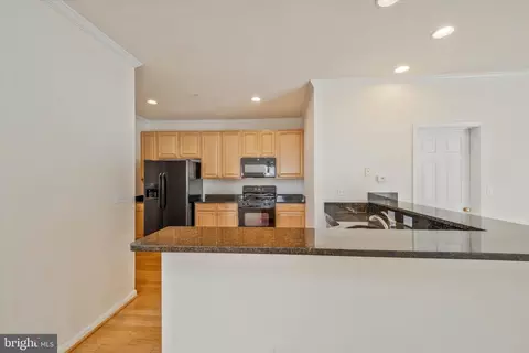 Kitchen - 14276 Foxhall Rd #21, Solomons, MD 20688 photo 1 of 5