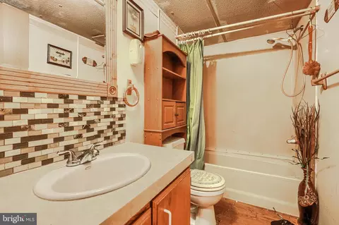 Bath - 7004 Beulah Rd, Hurlock, MD 21643 photo 1 of 2