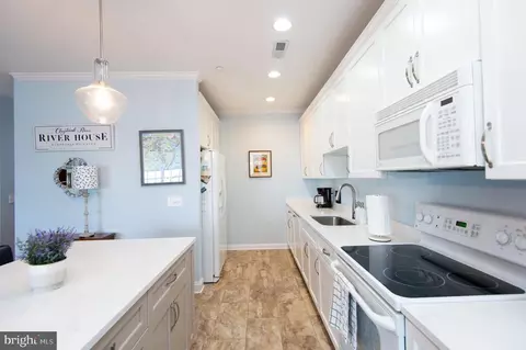 Kitchen - 3 Oakley St #202, Cambridge, MD 21613 photo 2 of 2