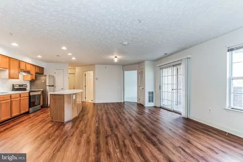 Living - 6512 Springwater Ct #4201, Frederick, MD 21701 photo 2 of 3