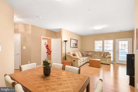 Living - 6340 Springwater Ter #1300C, Frederick, MD 21701 photo 6 of 7