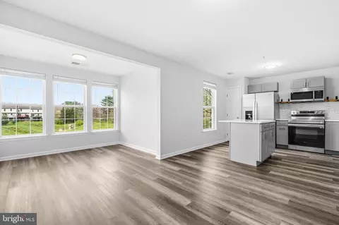 Living - 6413 Weatherby Ct #E, Frederick, MD 21703 photo 3 of 3