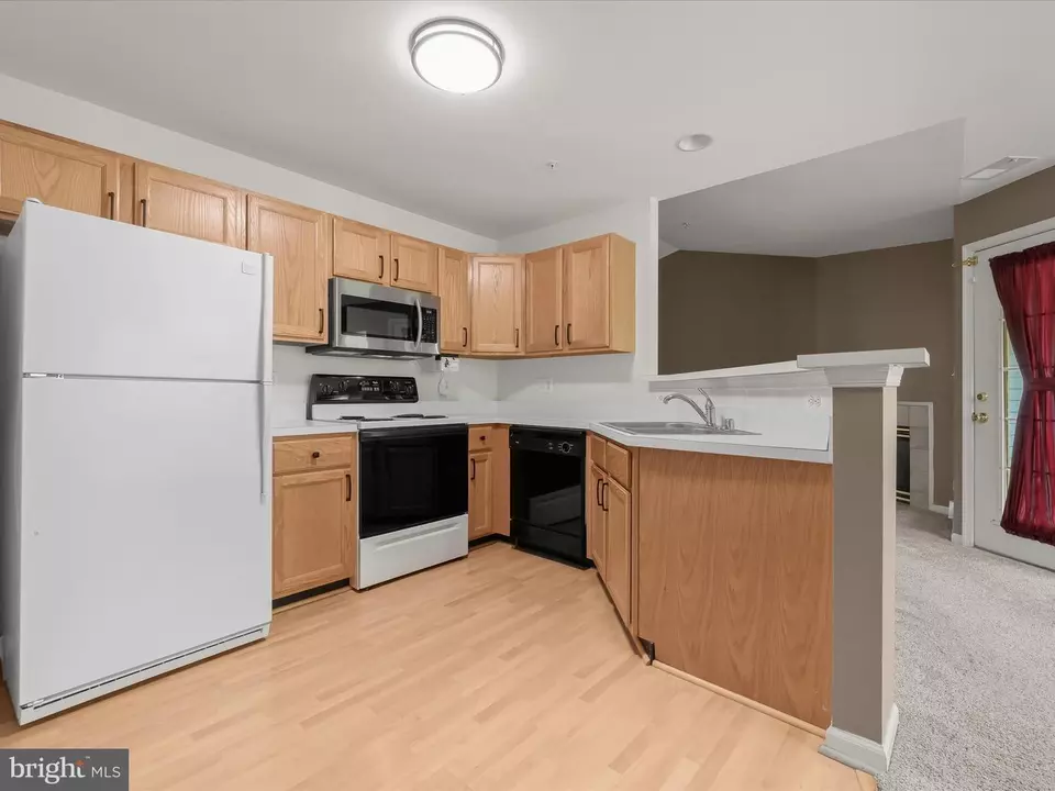 Kitchen - 6288 Wild Swan Way #202, Columbia, MD 21045 photo 2 of 3