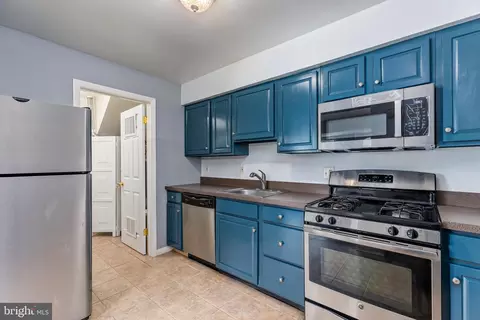 Kitchen - 9170 Hitching Post Ln #J, Laurel, MD 20723 photo 2 of 2