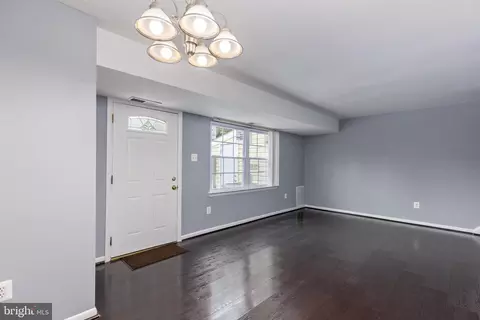 Living - 9170 Hitching Post Ln #J, Laurel, MD 20723 photo 2 of 3