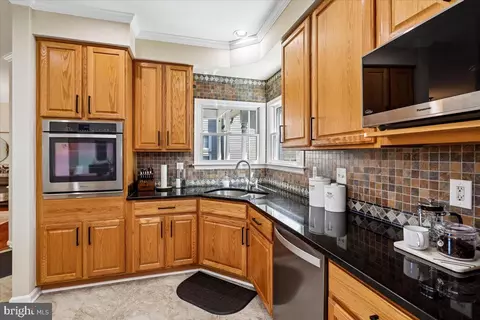 Kitchen - 9909 Midsummer Snow Ln, Laurel, MD 20723 photo 2 of 3