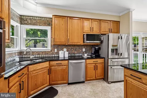 Kitchen - 9909 Midsummer Snow Ln, Laurel, MD 20723 photo 3 of 3