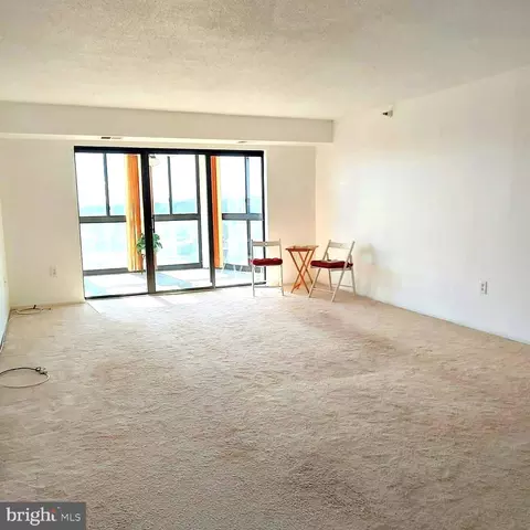 Living - 15115 Interlachen Dr #3-1010, Silver Spring, MD 20906 photo 2 of 6
