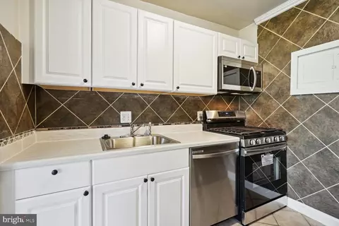 Kitchen - 3834 Bel Pre Rd #3834-2, Silver Spring, MD 20906 photo 2 of 2