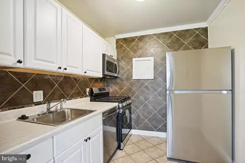 Kitchen - 3834 Bel Pre Rd #3834-2, Silver Spring, MD 20906 photo 1 of 2